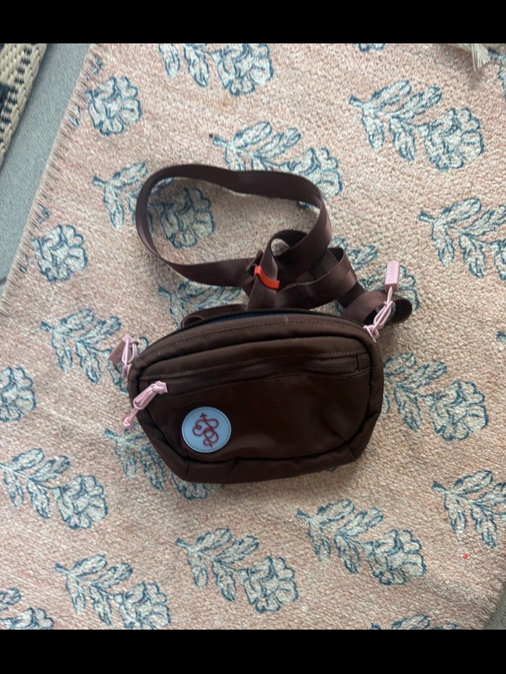 Baboon to the Moon Brown Crossbody Belt Bag with Pink Accents